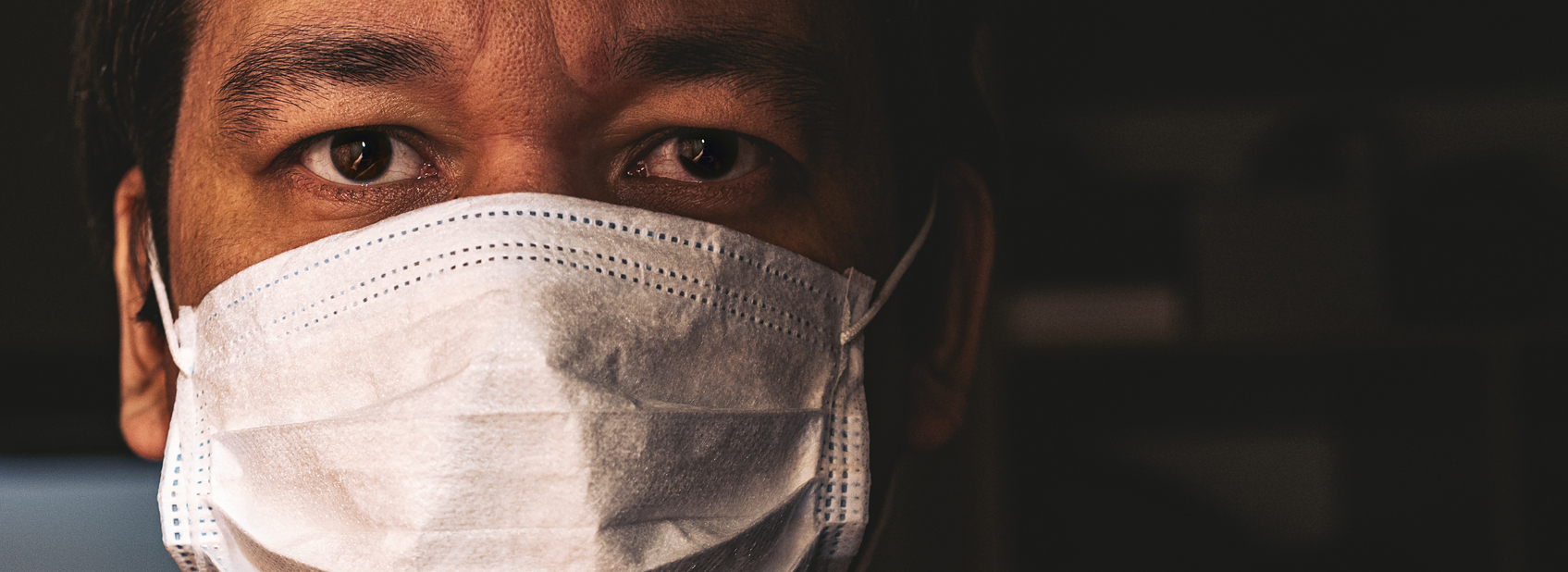 Closeup of man in a COVID mask