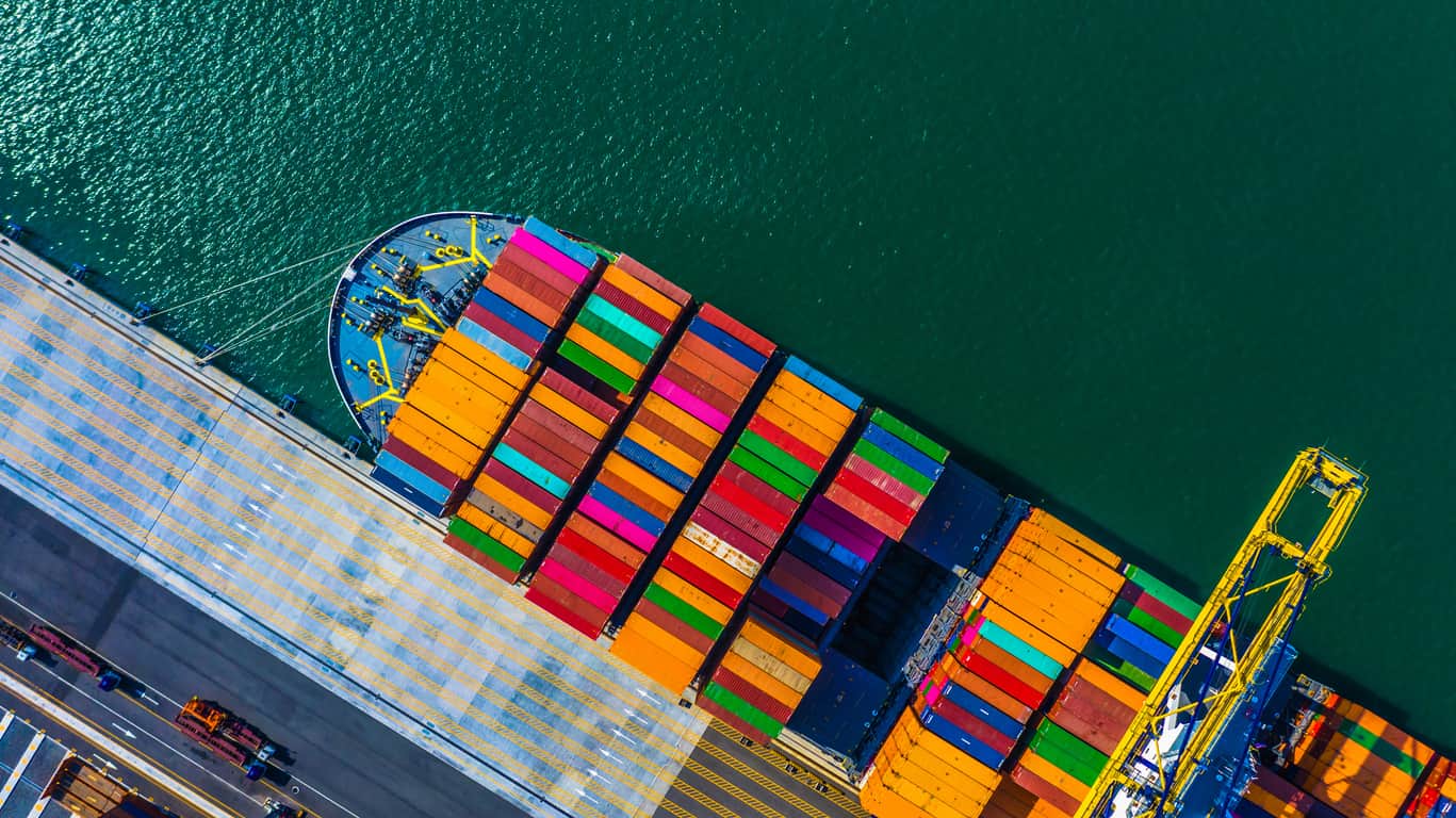 Overhead view of a cargo ship stacked with containers