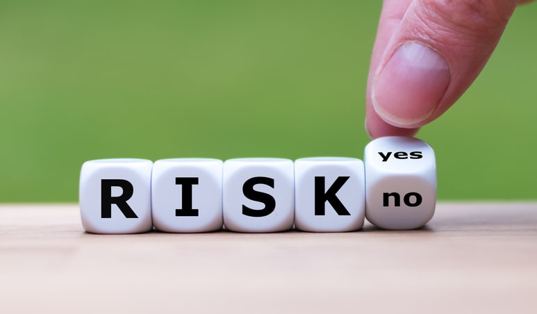 Plastic cubes spelling out RISK