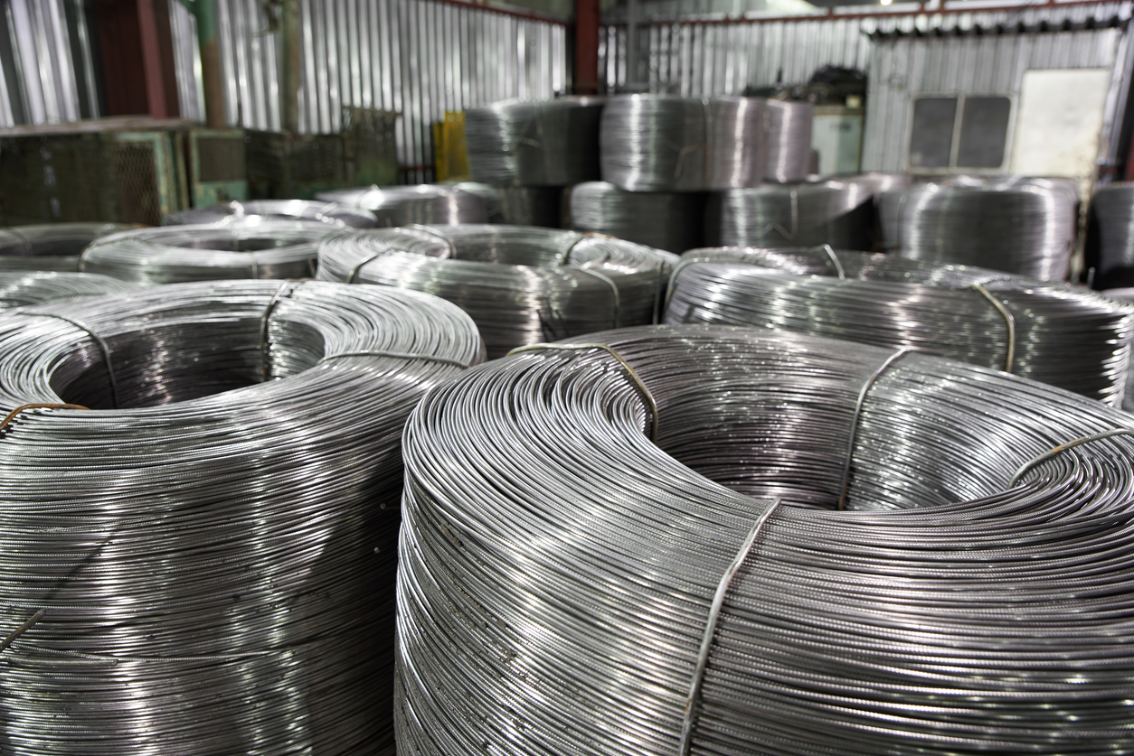 Spools of imported aluminum metal wire in a warehouse