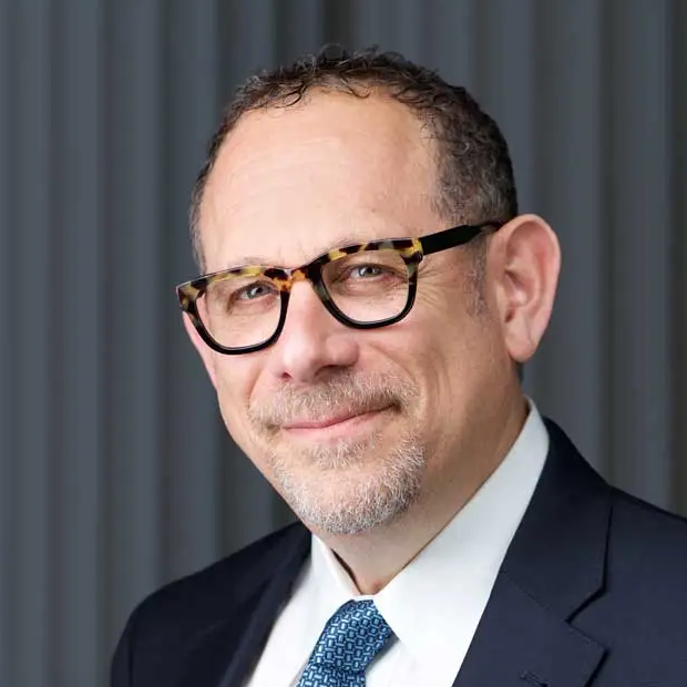 A headshot of whistleblower lawyer Mark A. Strauss